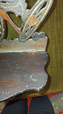 Lot 6 - A pair of pierced and painted fretwork folding wall shelves.