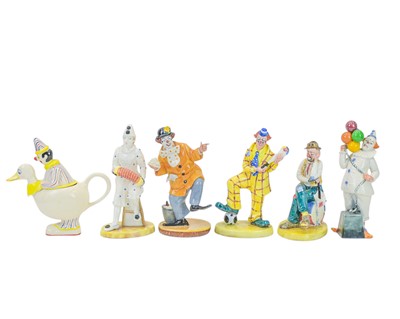 Lot 251 - Royal Doulton and Coalport clowns.