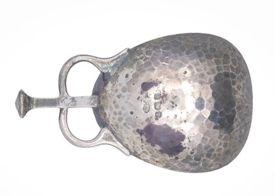 Lot 22 - An Edwardian Art & Crafts silver caddy spoon by Albert Edward Jones.