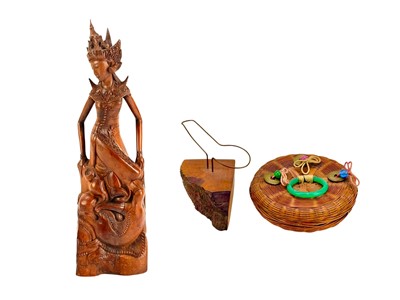 Lot 760 - A finely carved Balinese hardwood figure of a Deity.