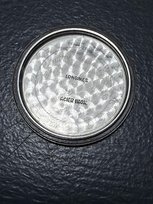 Lot 641 - LONGINES - A WWII era (possibly French Resistance) stainless steel gentleman's wristwatch.