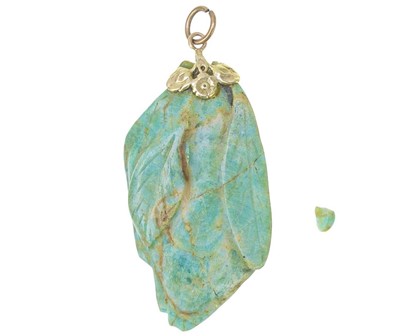 Lot 547 - An amazonite gold mounted pendant.