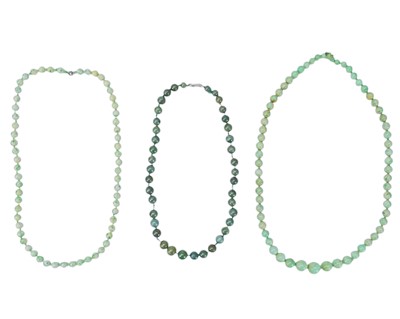 Lot 508 - Three jadeite and nephrite beaded necklaces.