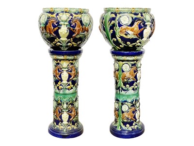 Lot 236 - A pair of continental majolica jardinieres and stands.