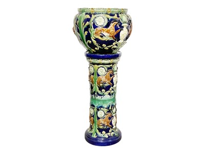 Lot 236 - A pair of continental majolica jardinieres and stands.