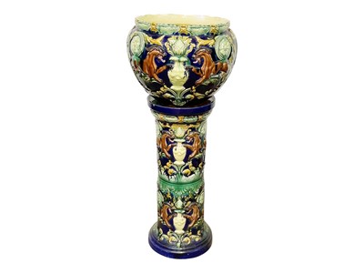 Lot 236 - A pair of continental majolica jardinieres and stands.