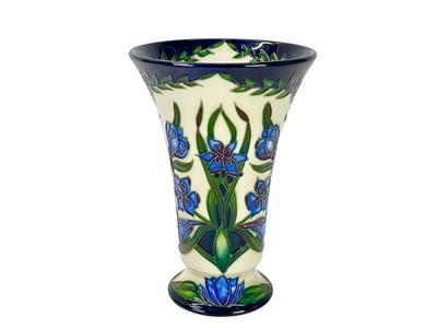 Lot 221 - A Moorcroft pottery 'Kaffir Lily' pattern vase.