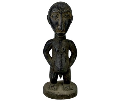 Lot 97 - A Luba figure of a man.