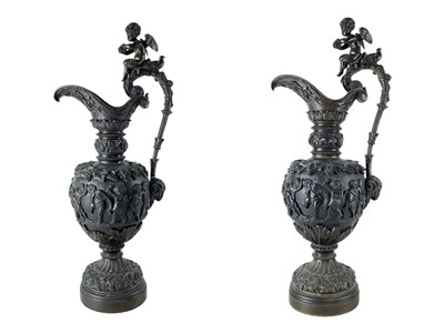 Lot 65 - A pair of substantial bronze side ewers.