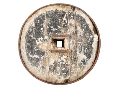 Lot 31 - A Middle Eastern oak and wrought iron cartwheel.