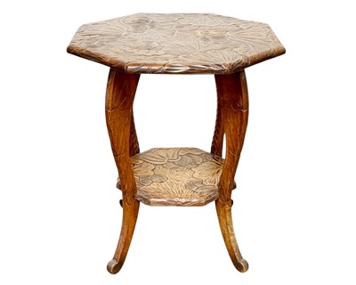 Lot 734 - A Japanese octagonal hardwood two-tier occasional table, probably retailed by Liberty.