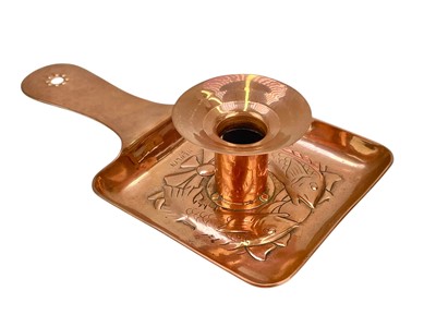 Lot 44 - A Newlyn copper chamber candlestick.
