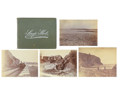 Lot 173 - An album of black and white photographs.