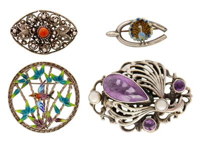 Lot 28 - A selection of four silver brooches.