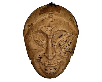Lot 46 - A 20th century painted plaster wall mask.