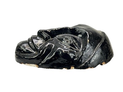 Lot 46 - A 20th century painted plaster wall mask.