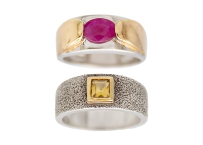 Lot 27 - A selection of two silver gem band rings.
