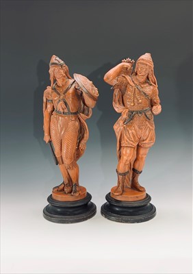 Lot 314 - Two 19th century German earthenware figures of...