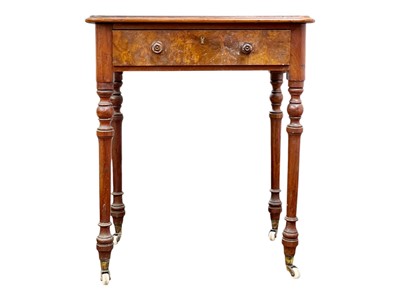 Lot 418 - A Victorian figured walnut side table.