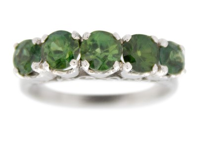 Lot 1 - A 9k white gold graduated five-stone synthetic spinel ring.