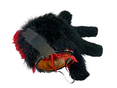 Lot 595 - A Scottish 1950s feather piper's bonnet.