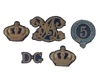 Lot 564 - Five Victorian bullion Dragoon Guards uniform badges.