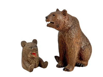 Lot 69 - A Black Forest carved bear inkwell.