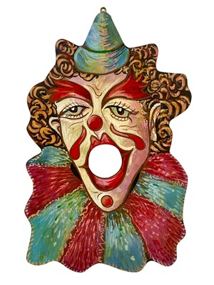 Lot 100 - A fairground style painted clown plaque.