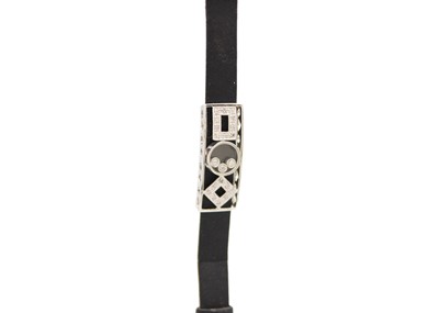 Lot 7 - A 9k white gold and diamonds sliding panel buckle bracelet.