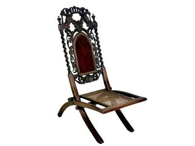 Lot 433 - A 19th century walnut Carolean style folding chair.