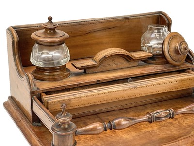 Lot 30 - A late Victorian olive wood desk stand.