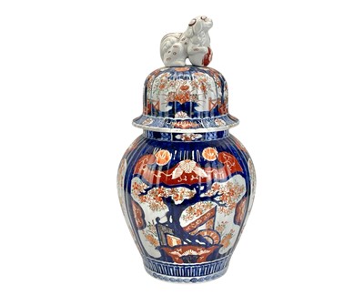 Lot 675 - A Japanese Imari porcelain vase and cover.