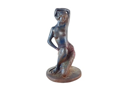 Lot 64 - An Art Deco style cast iron figure of an Egyptianesque female.