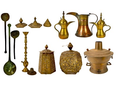Lot 654 - A collection of brassware.