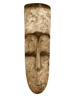 Lot 39 - Three carved wood African Fang masks.