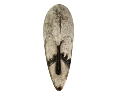 Lot 39 - Three carved wood African Fang masks.