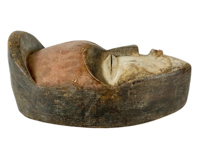 Lot 37 - A polychrome African mask.