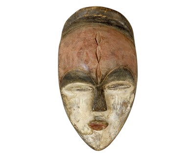 Lot 37 - A polychrome African mask.