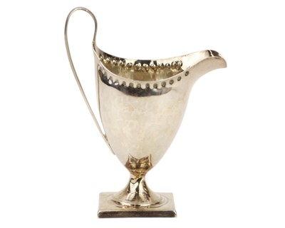 Lot 181 - A Georgian helmet shaped cream jug.