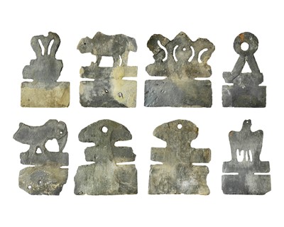 Lot 74 - Nine Breton slate decorative ridge tiles, probably 19th century.