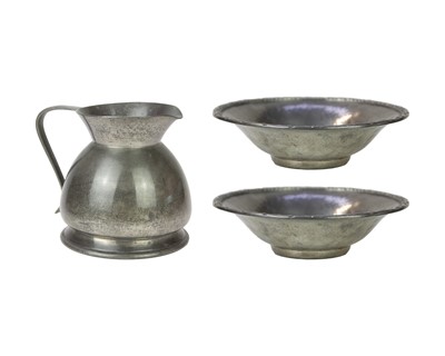 Lot 126 - A pair of Liberty & Co Tudric hammered pewter pedestal bowls.