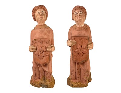 Lot 77 - A pair of 16th century French carved wood polychrome painted figures.