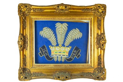 Lot 215 - A gold thread and padded fabric Plume of Feathers embroidery.