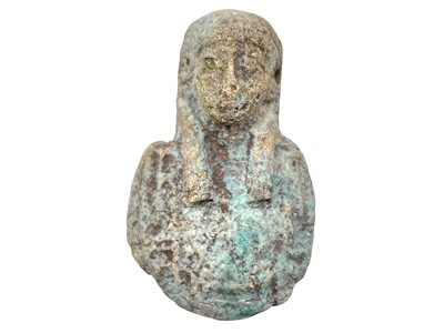 Lot 125 - An Egyptian turquoise glazed faience amulet of Isis.