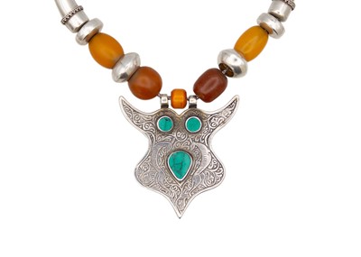 Lot 72 - A Middle Eastern amber and turquoise silver necklace.