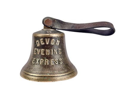Lot 10 - A rare Devon Evening Express handbell.