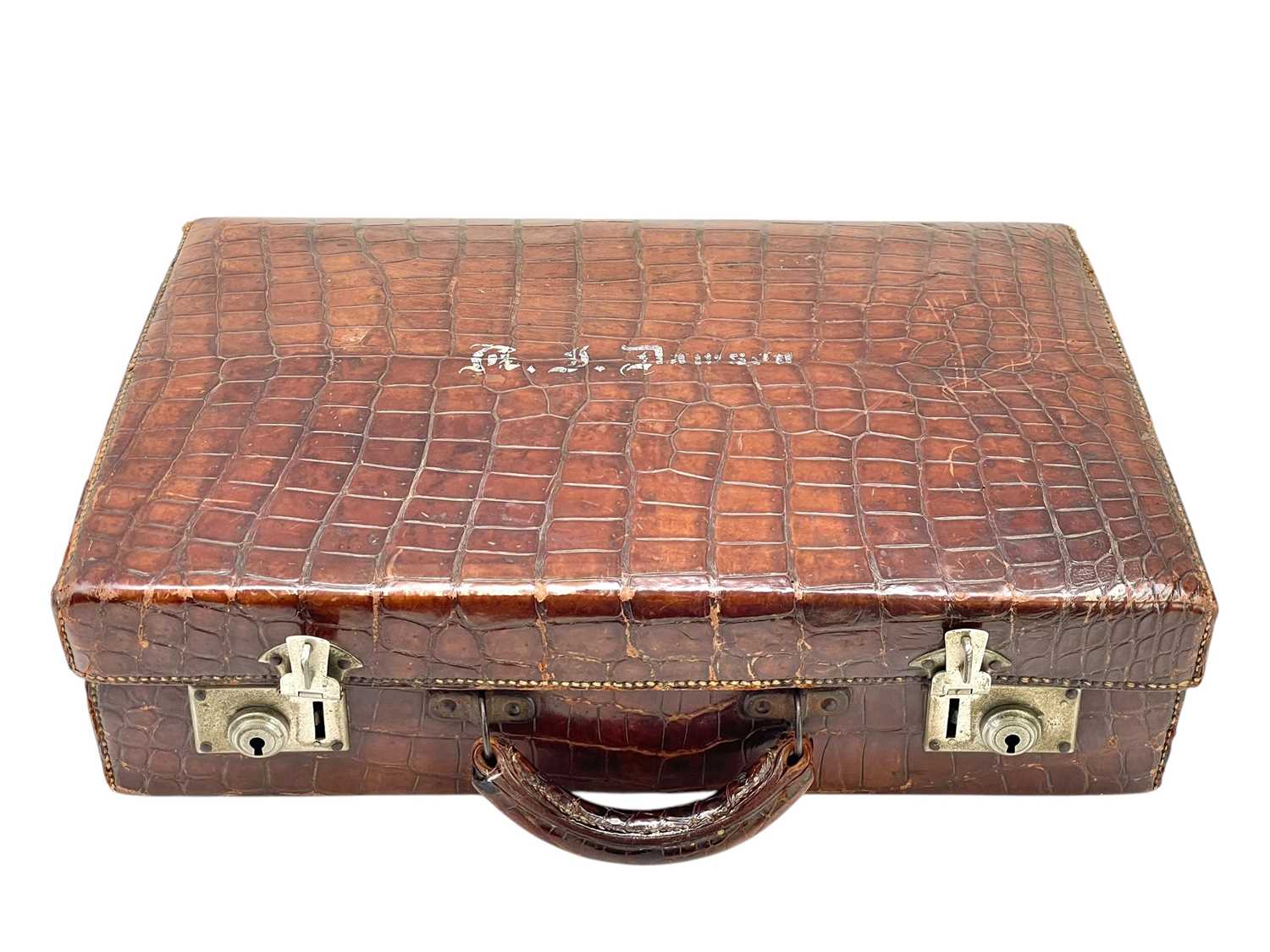 Lot 20 - A small crocodile attache or briefcase.