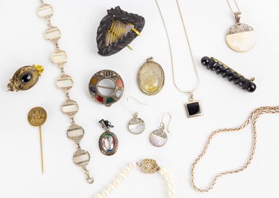 Lot 45 - A selection of costume jewellery, including an Irish bog-oak harp brooch.