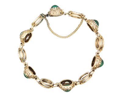 Lot 43 - A silver gilt malachite set bracelet.