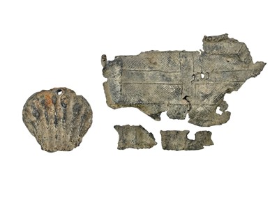 Lot 11 - A Medieval lead coffin shaped ampulla.